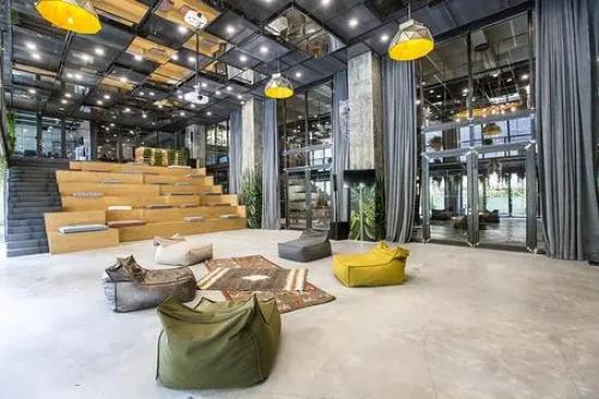 越来越多办公企业倾向于共享办公室